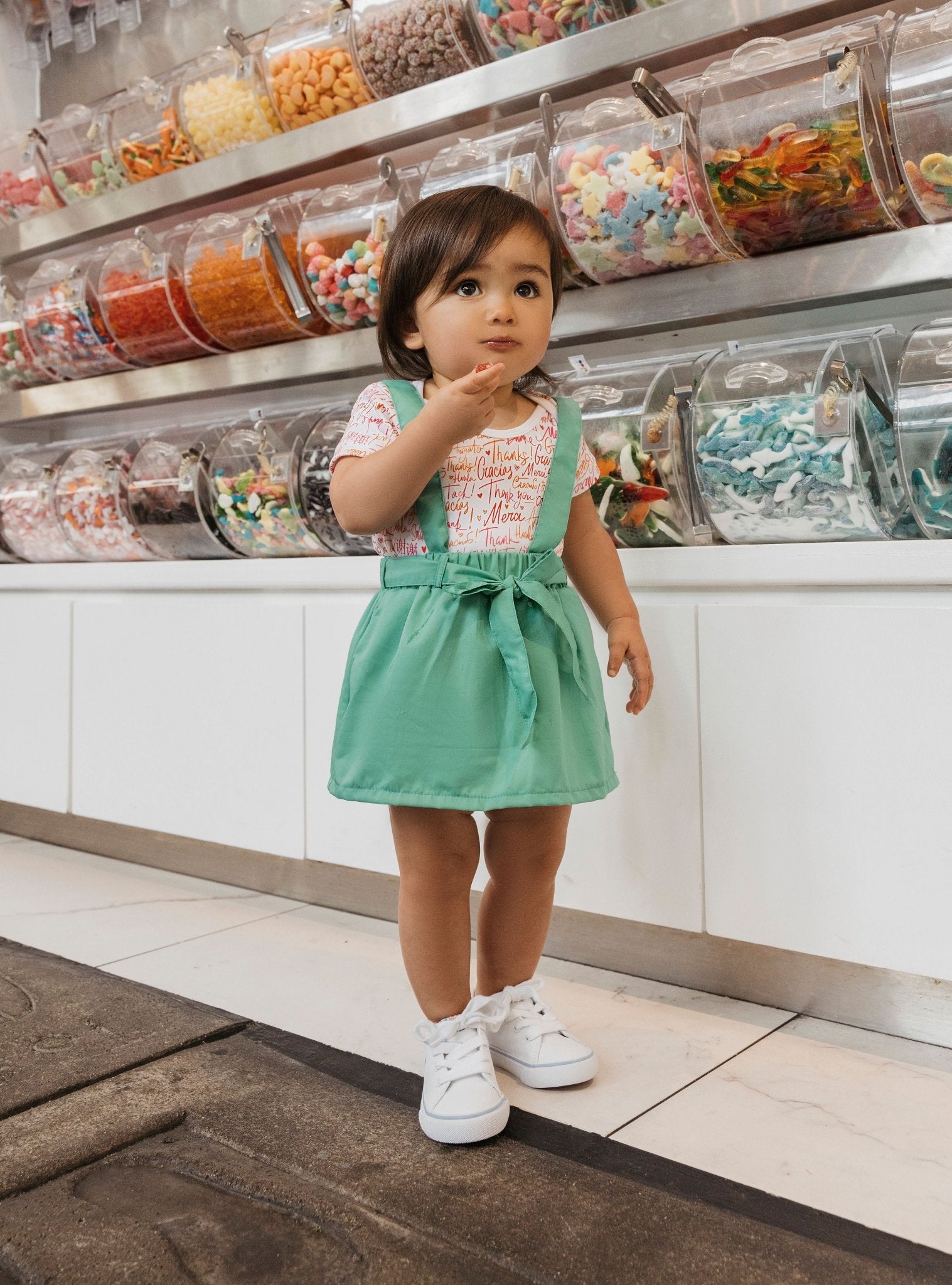 Infant jupe jumper by Mixed Up Clothing featuring vibrant multicultural prints in soft breathable cotton baby outfit